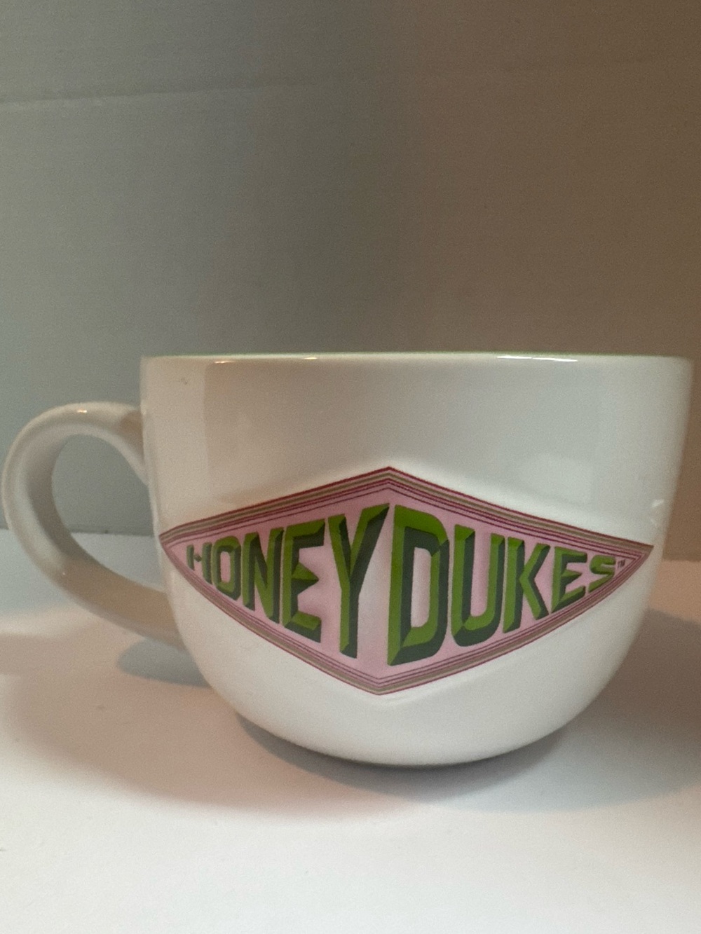 Wizarding World of Harry Potter Honey Dukes Logo Mug White Green Pink